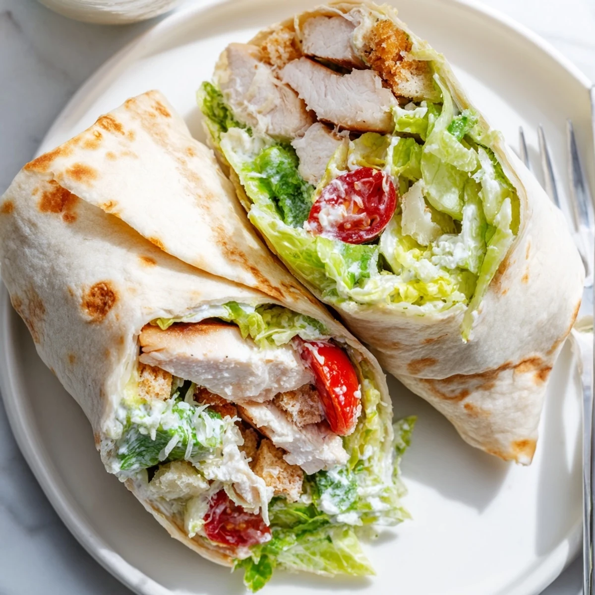 Delicious Chicken Caesar Wrap Hack, bursting with flavors and crispy croutons.  