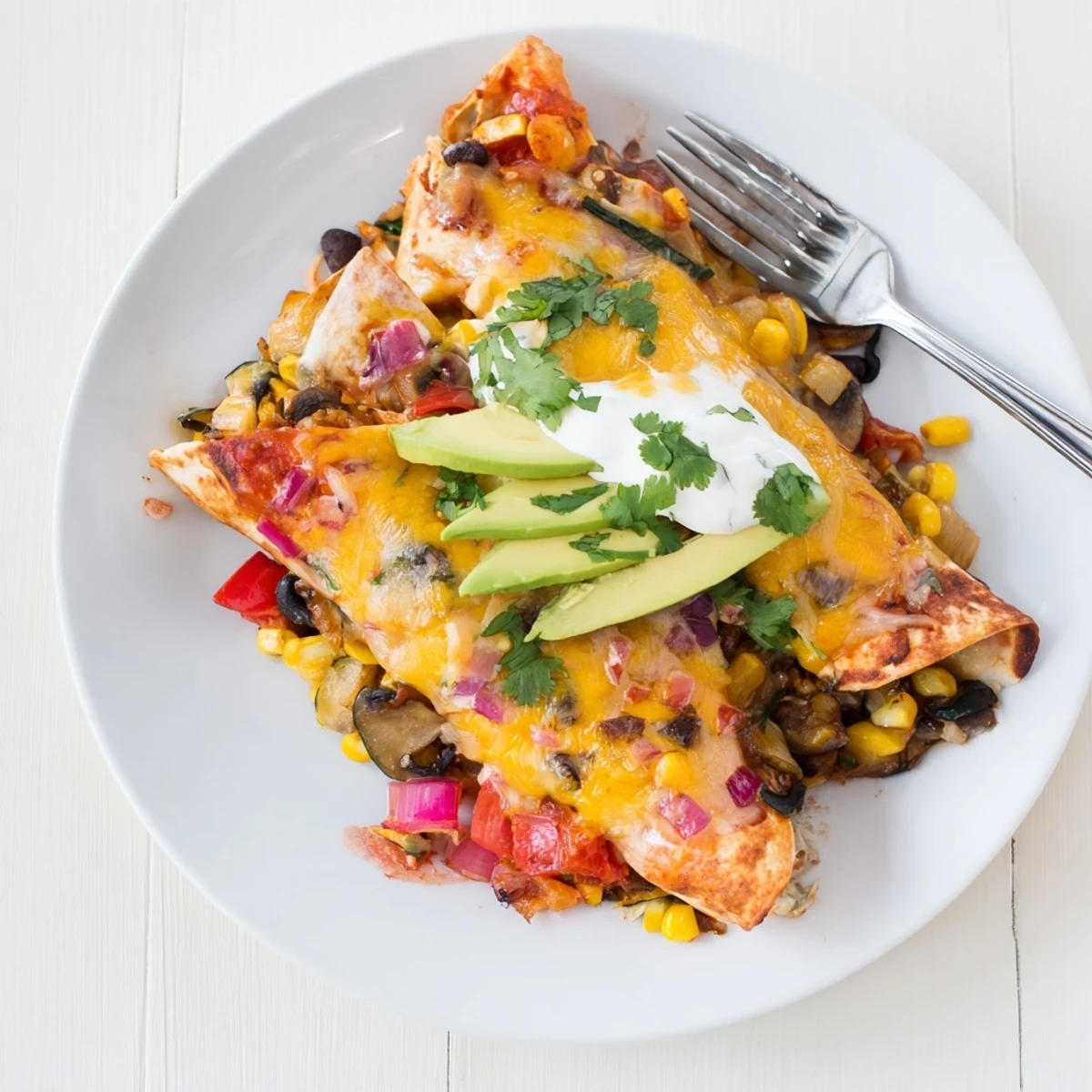 Flavorful Farmers Market Vegetarian Enchiladas packed with colorful veggies and tangy sauce.  