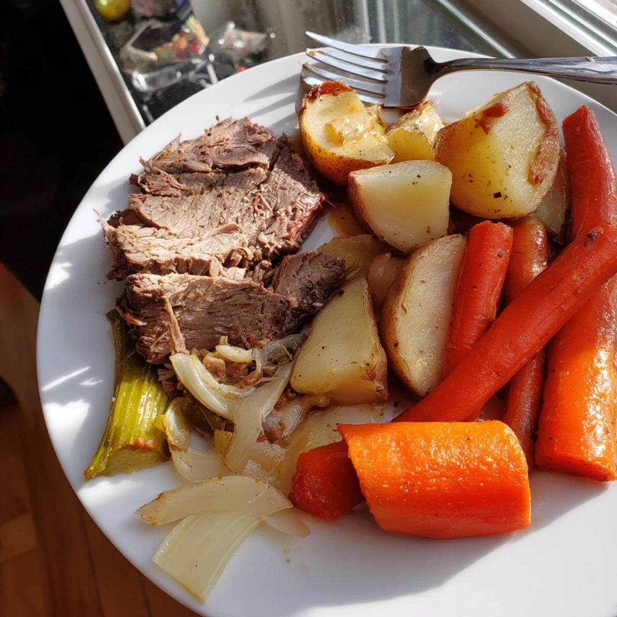 Sunday Pot Roast with roasted vegetables, fork-tender beef and hearty veggies in delicious broth.