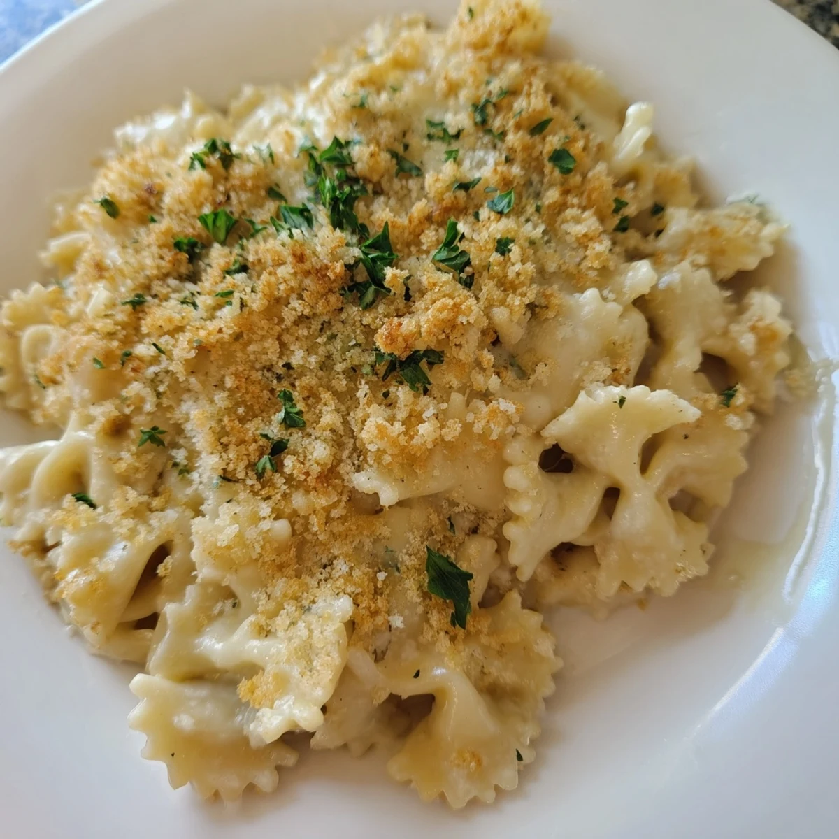 Golden-brown, bubbly lightened Mac & Cheese Snowflake Pasta Bake, perfectly baked and ready to enjoy.