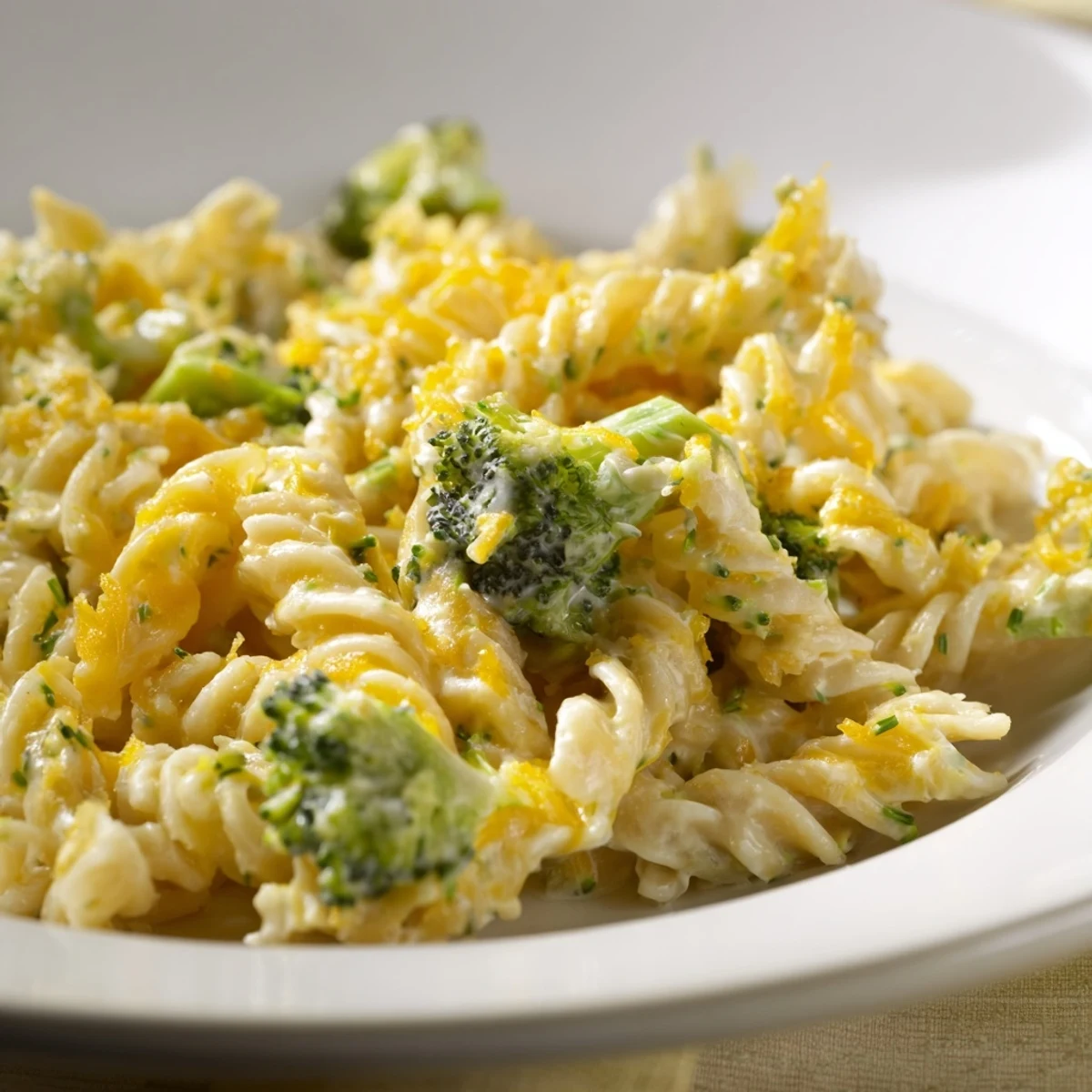 Flavorful Green Goddess Broccoli Cheddar One-Pot Pasta, a comforting vegetarian meal served in a big bowl.