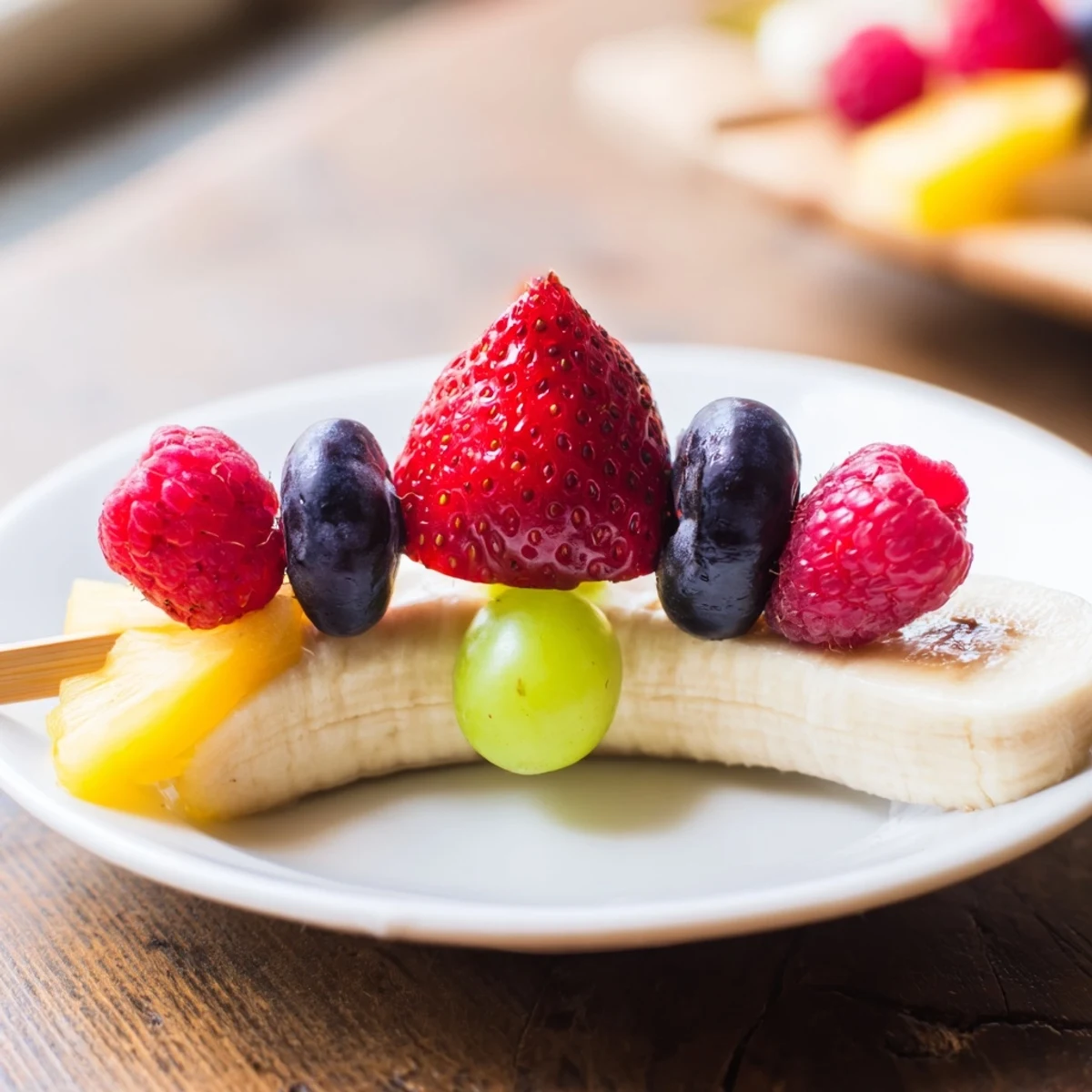 Sweet and delicious rocket ship fruit skewers recipe: kid-friendly snack with assorted, fresh fruit pieces.