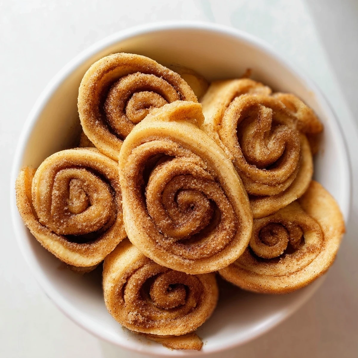 A warm, beautifully glazed cinnamon roll pull-apart wreath, perfect for sharing at any brunch.