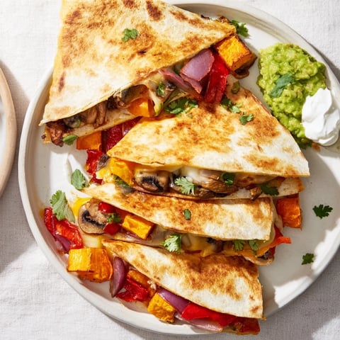 Loaded Autumn Veggie Quesadillas bursting with roasted flavors, perfect for cozy evenings.  