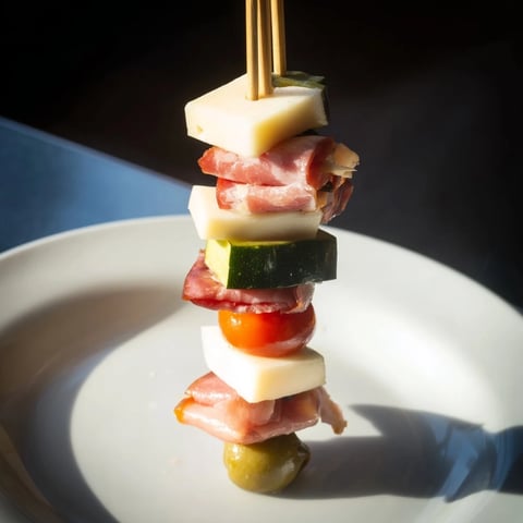 Savory Skewers: Meat, Cheese, and Pickle Cube Skewers, a delicious appetizer ready in minutes, perfectly presented.