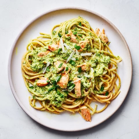 Golden chicken pieces nestle in creamy pesto-egg sauce atop the delicious Pesto Egg and Chicken Pasta.